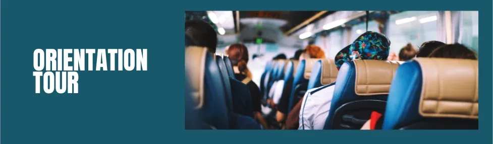 what is an orientation tour image showing people sitting on a coach, view from middle of the coach looking forward