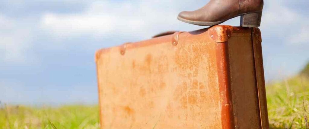 foot on old suitcasecoach holidays for single travellers the professional traveller