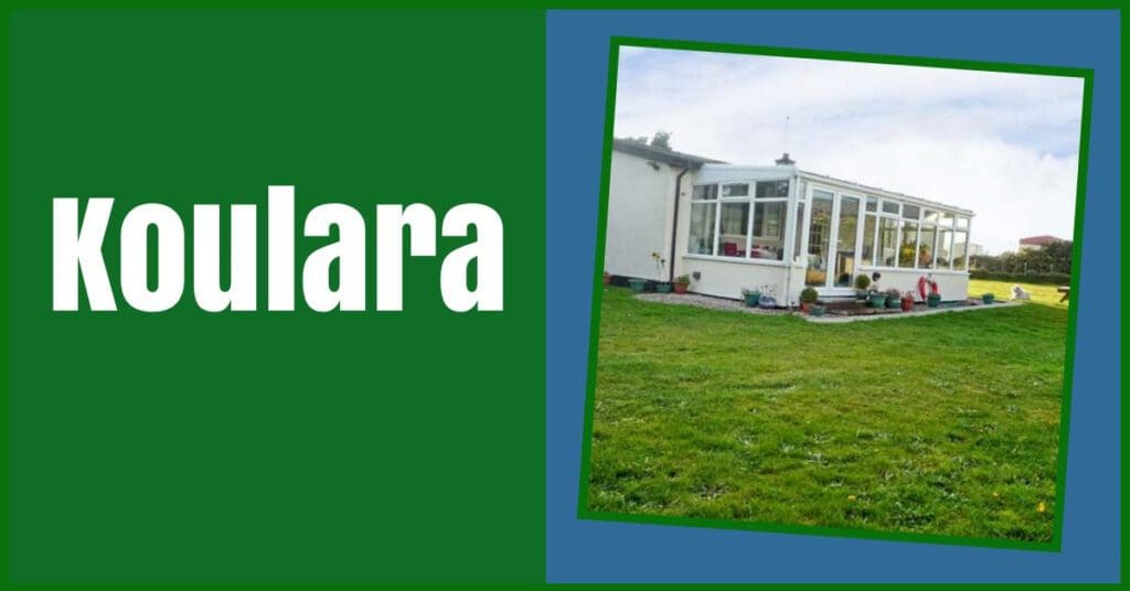 view of conservatory with dog sitting outside on grass southerness self catering