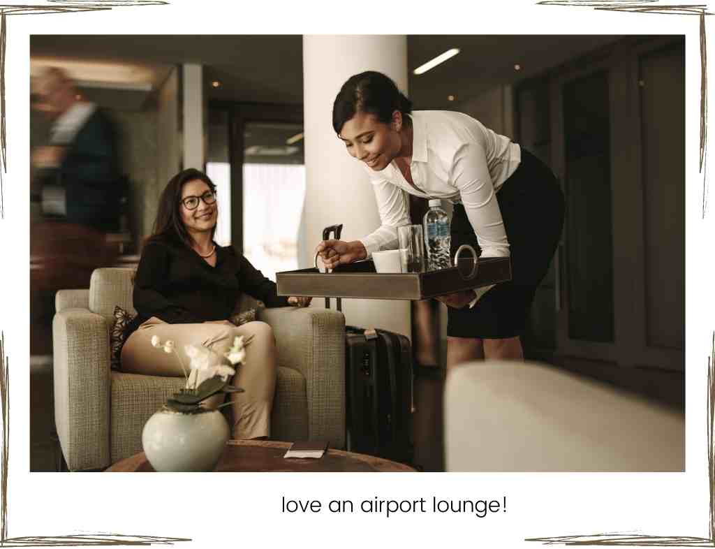 picture shows woman serving drink to another in an airport lounge pass