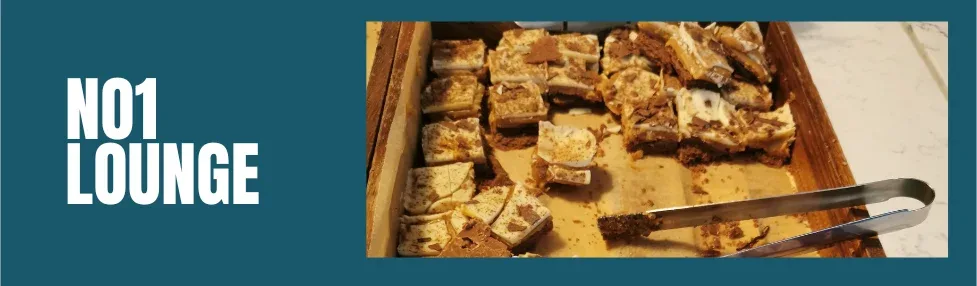 no 1 lounge gatwick north showing cake bites and tongs in a serving tray