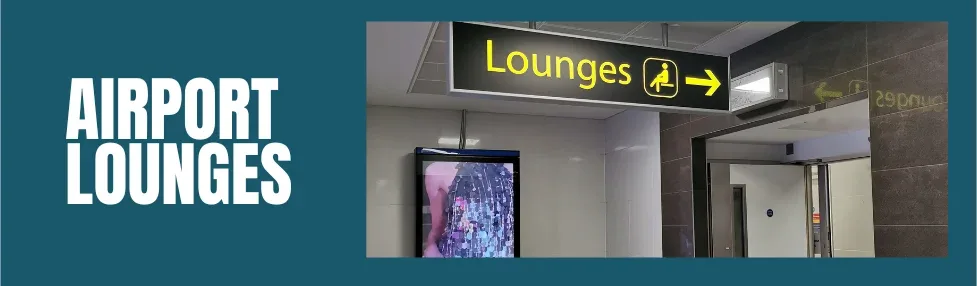 priority pass lounges gatwick airport overhead illuminated sign with yellow riting showing entrance to lounge pavillion