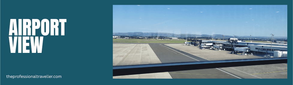 upper deck lounge glasgow airport with view of the airport apron